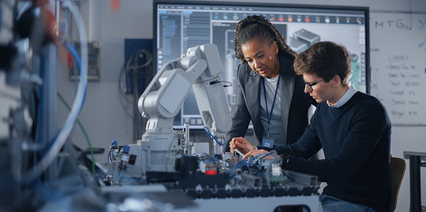 Student with co-robot - VDI invites Young Automation Challenge in Intralogistics